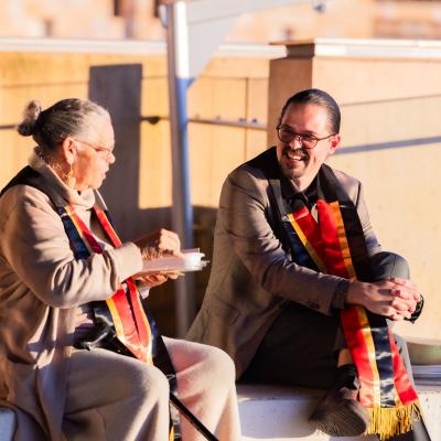 Two graduates at the 2025 mid-year Aboriginal and Torres Strait Islander sashing ceremony