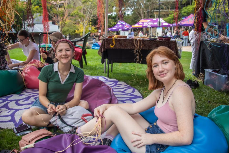 Students weaving with Aunty Jeannine at NRW Blak Markets