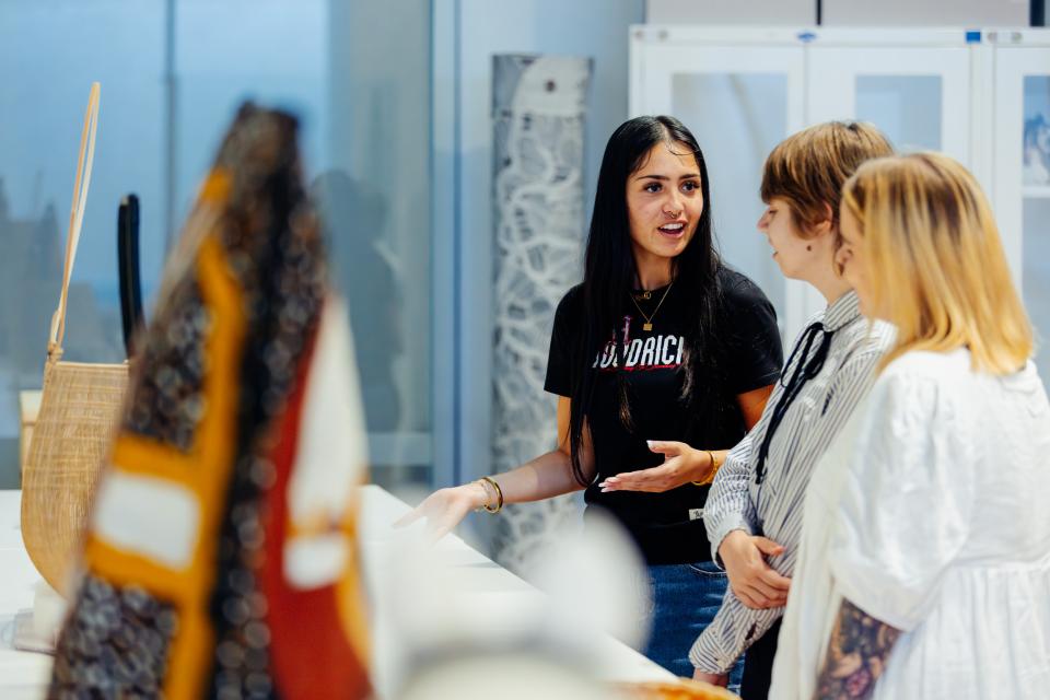 Ngugi/Quandamooka woman Braelyn Rolfe-Chase from the UQ Art Museum leads one of the popular NAIDOC Art Walking Tours